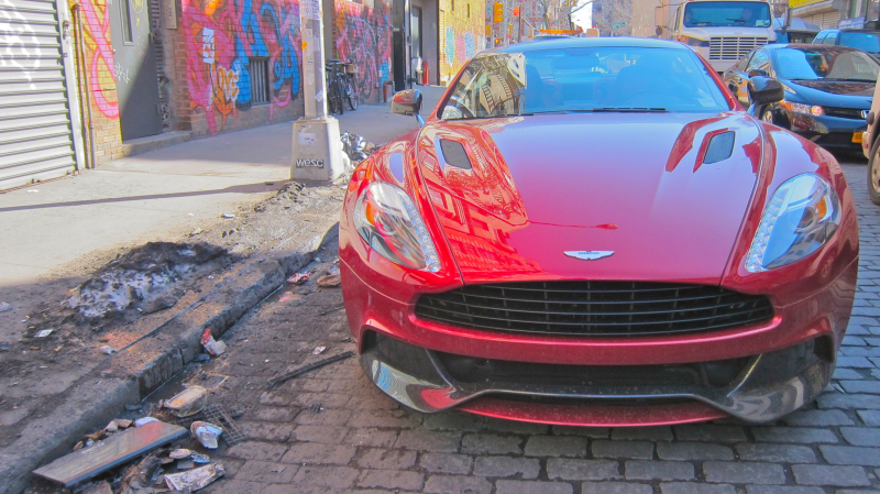 Illustration for article titled The Sadomasochistic Joy Of Driving A $300K Aston Martin In New York